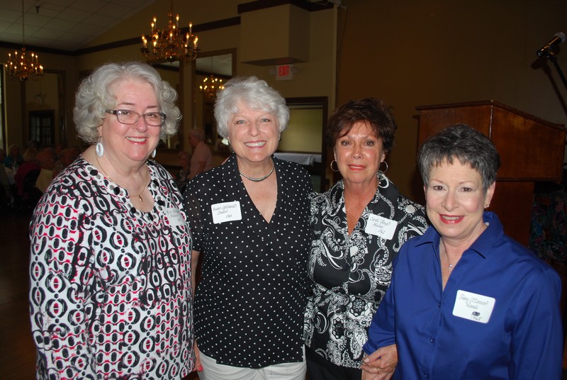Alice Stewart Shehane, Susan Gilliland Trailov, Carol Boyd Hulan, and Patsy O'Conner Wessels, color guard and majorettes in the band.